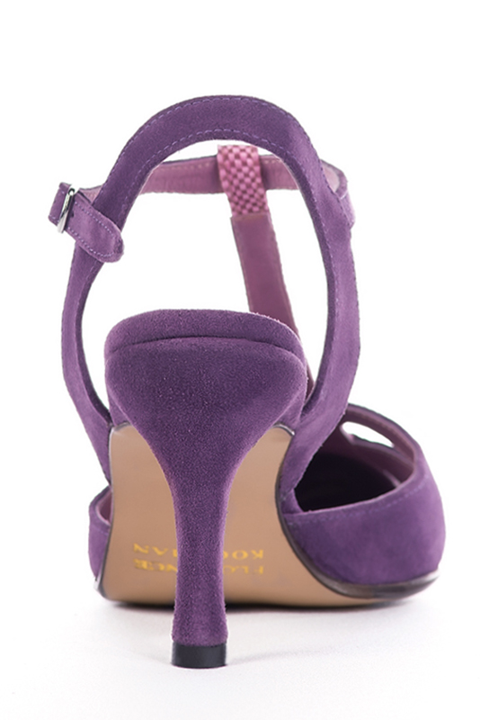Hot pink and amethyst purple women's open back T-strap shoes. Tapered toe. High slim heel. Worn view - Florence KOOIJMAN